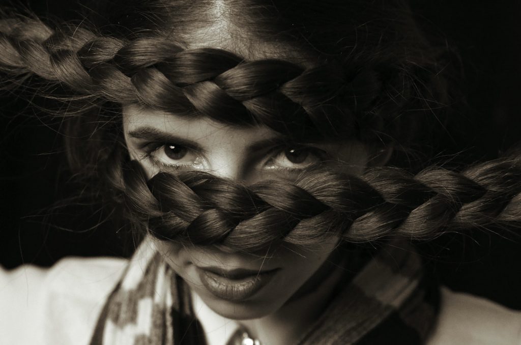 young girl with braided hair